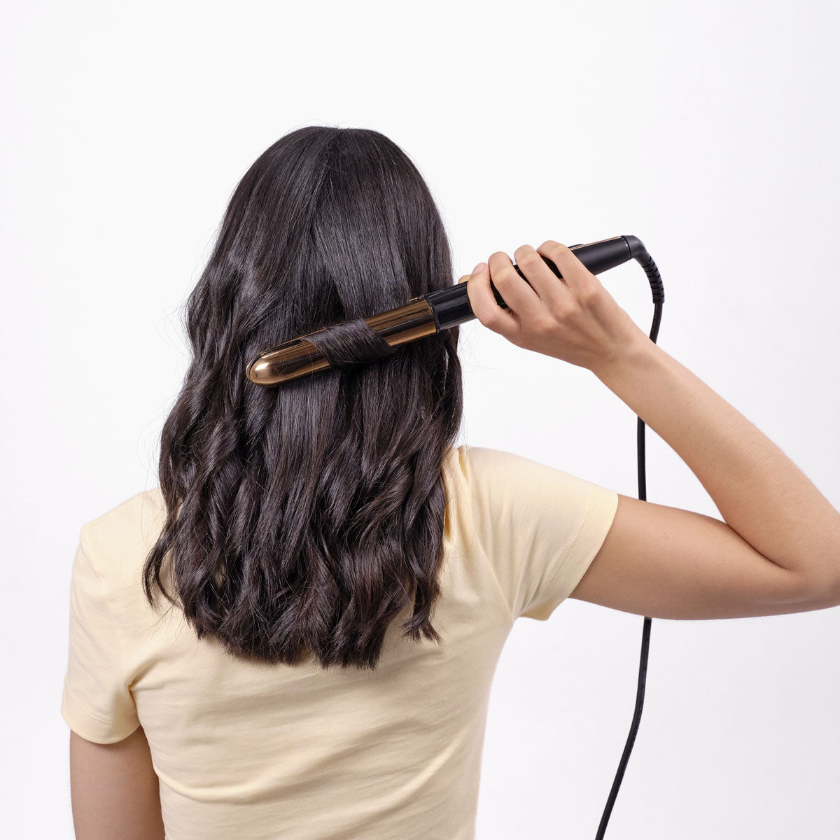 Titanium Brilliance Straight & Curl in Rose Gold in use on curly hair
